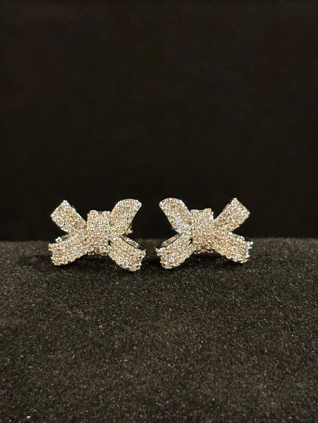 Elegant Bow Stud Earrings – Sterling Silver