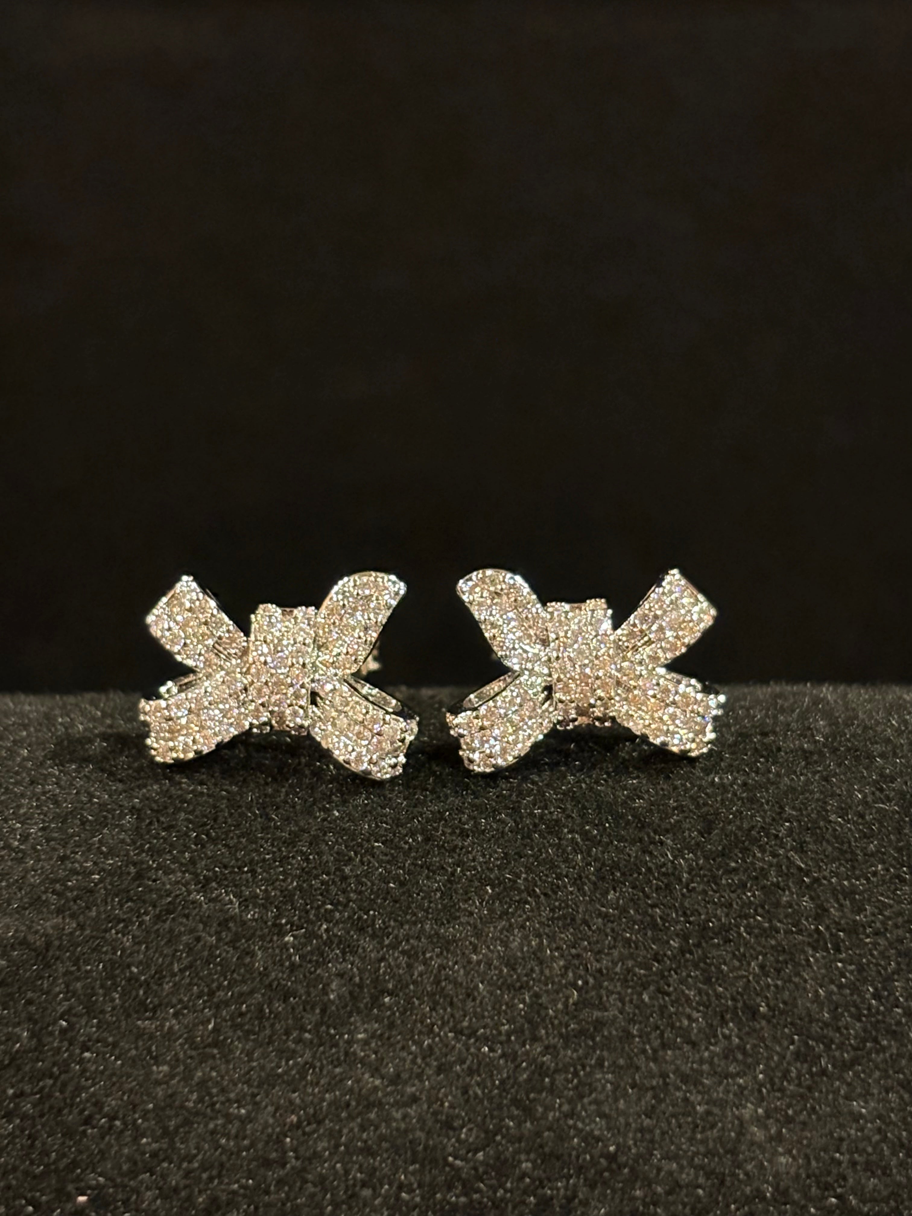 Elegant Bow Stud Earrings – Sterling Silver