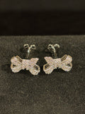 Elegant Bow Stud Earrings – Sterling Silver