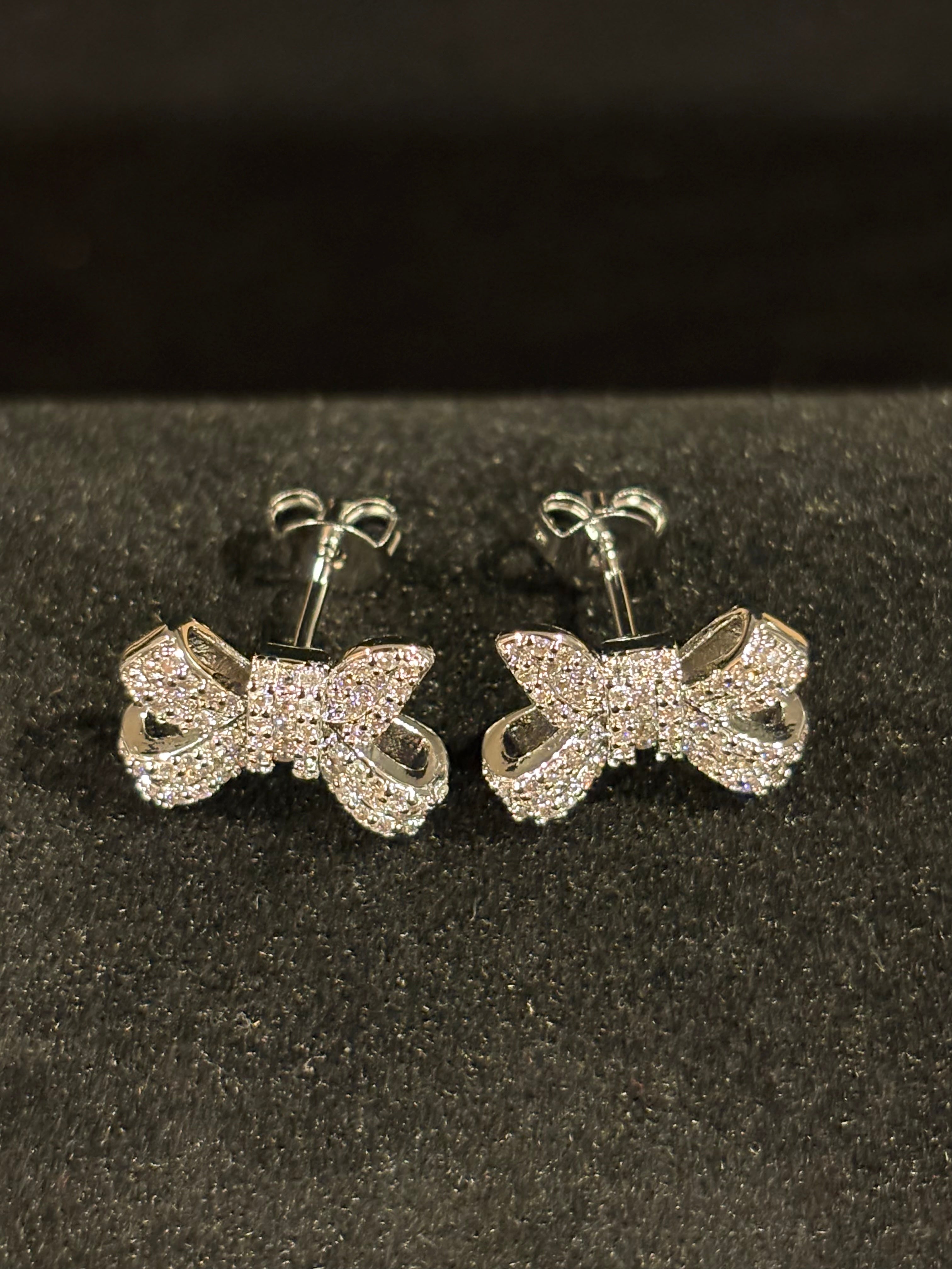 Elegant Bow Stud Earrings – Sterling Silver