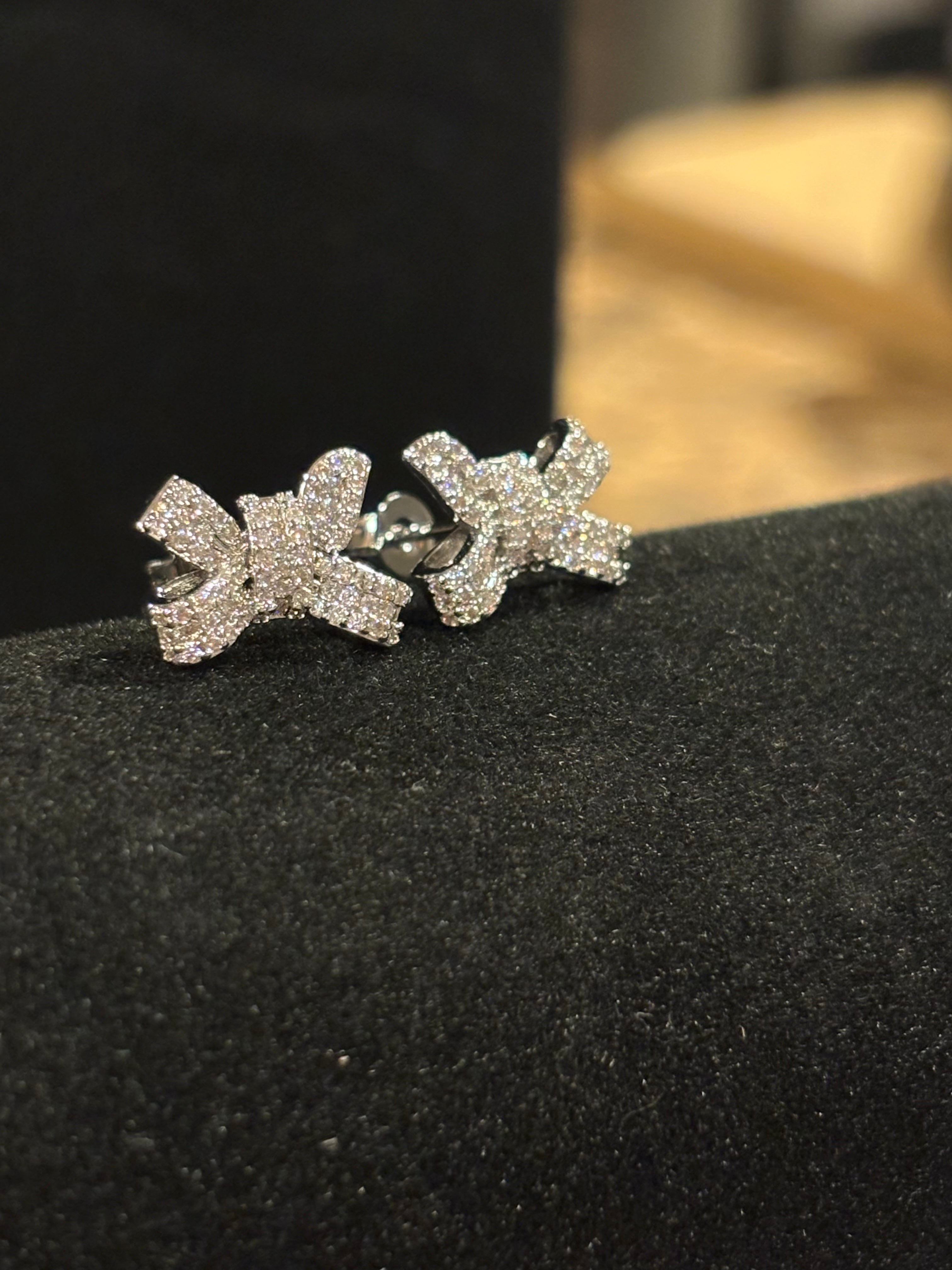 Elegant Bow Stud Earrings – Sterling Silver