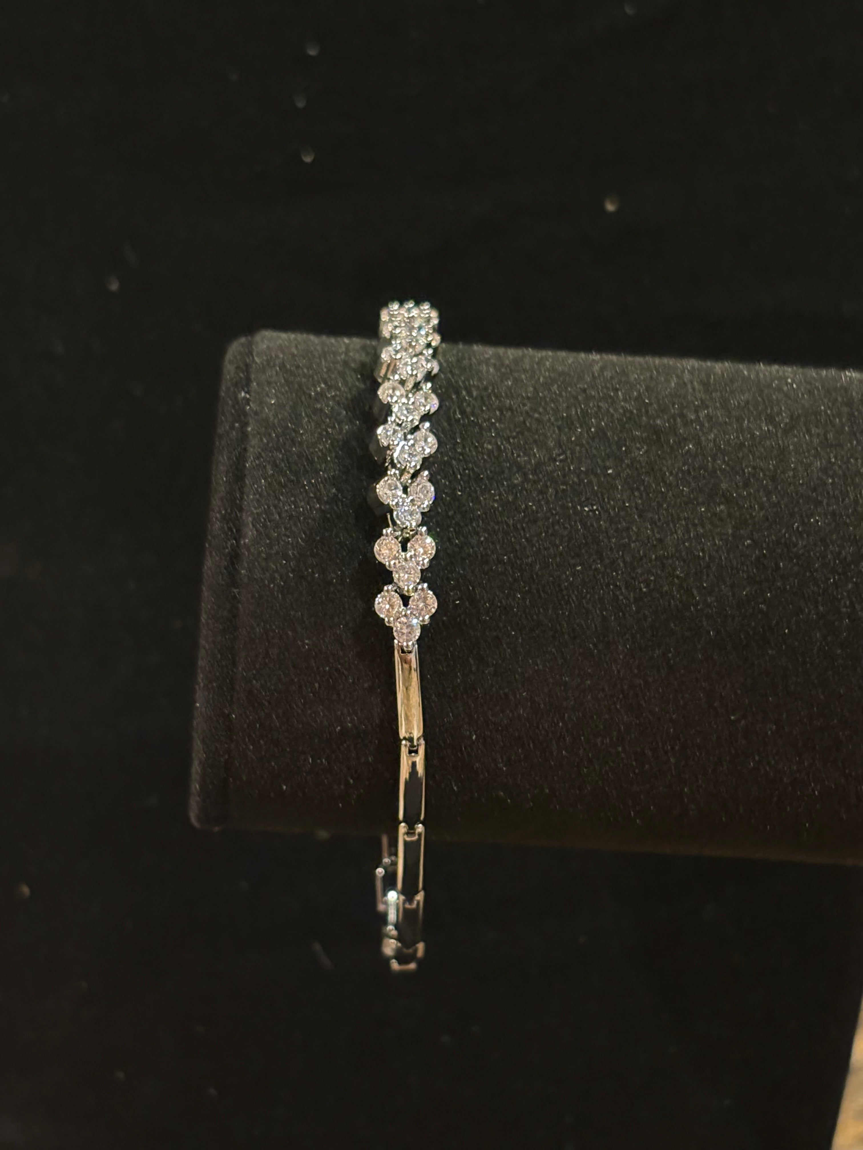 Botanical Radiance: Floral Cluster Tennis Bangle Bracelet
