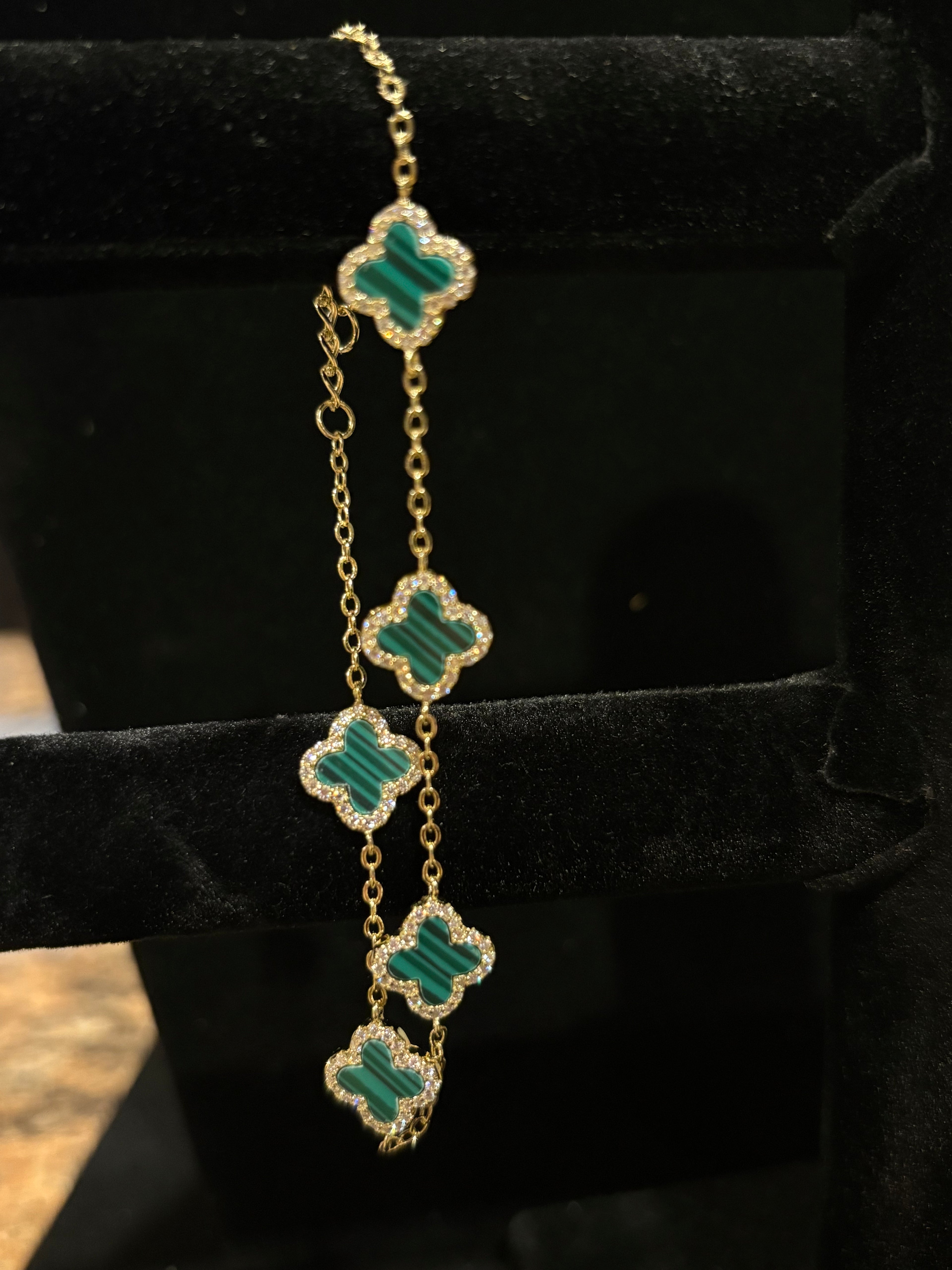 Elegant Five-Motif Green Clover Charm Bracelet
