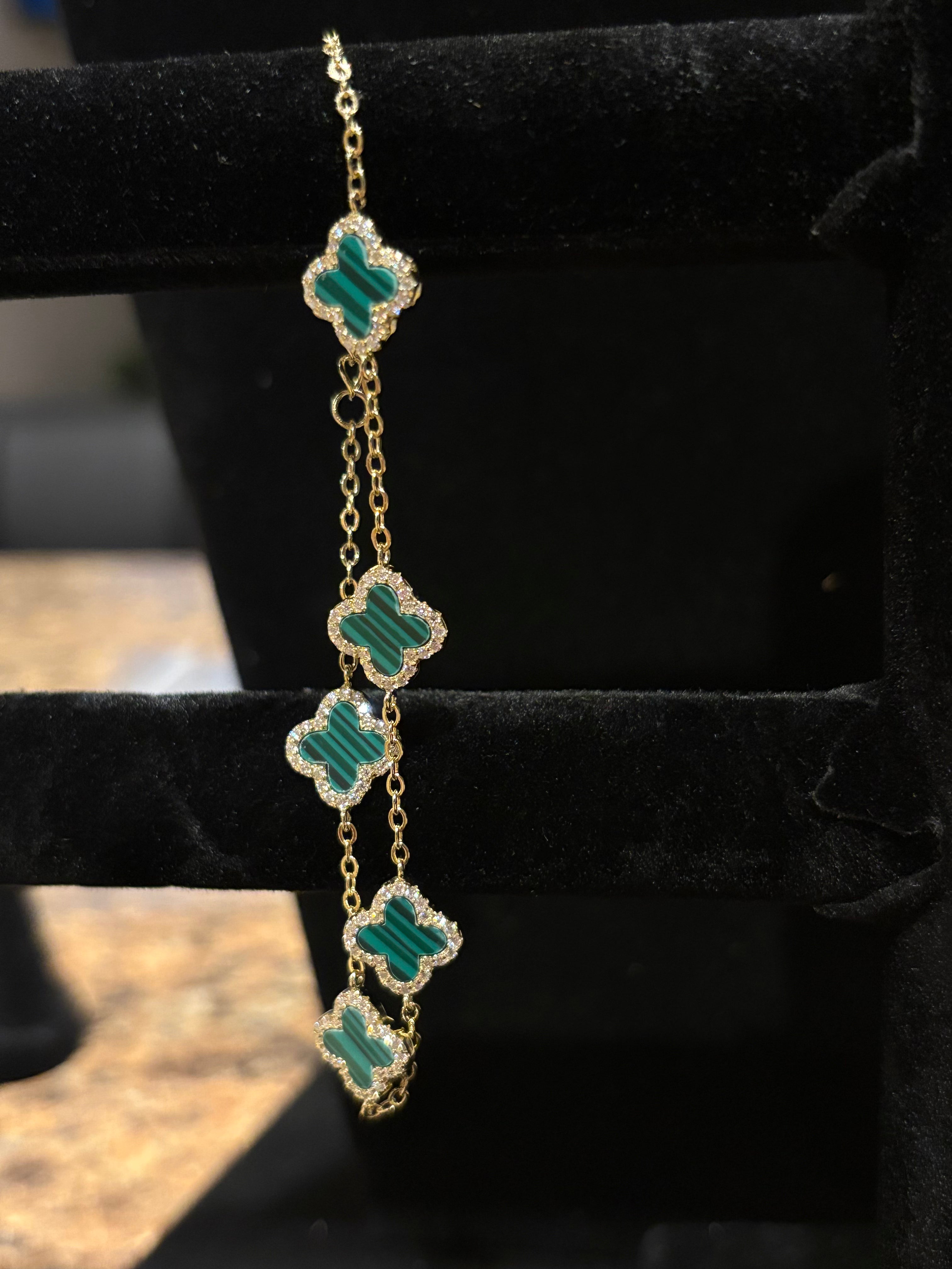 Elegant Five-Motif Green Clover Charm Bracelet