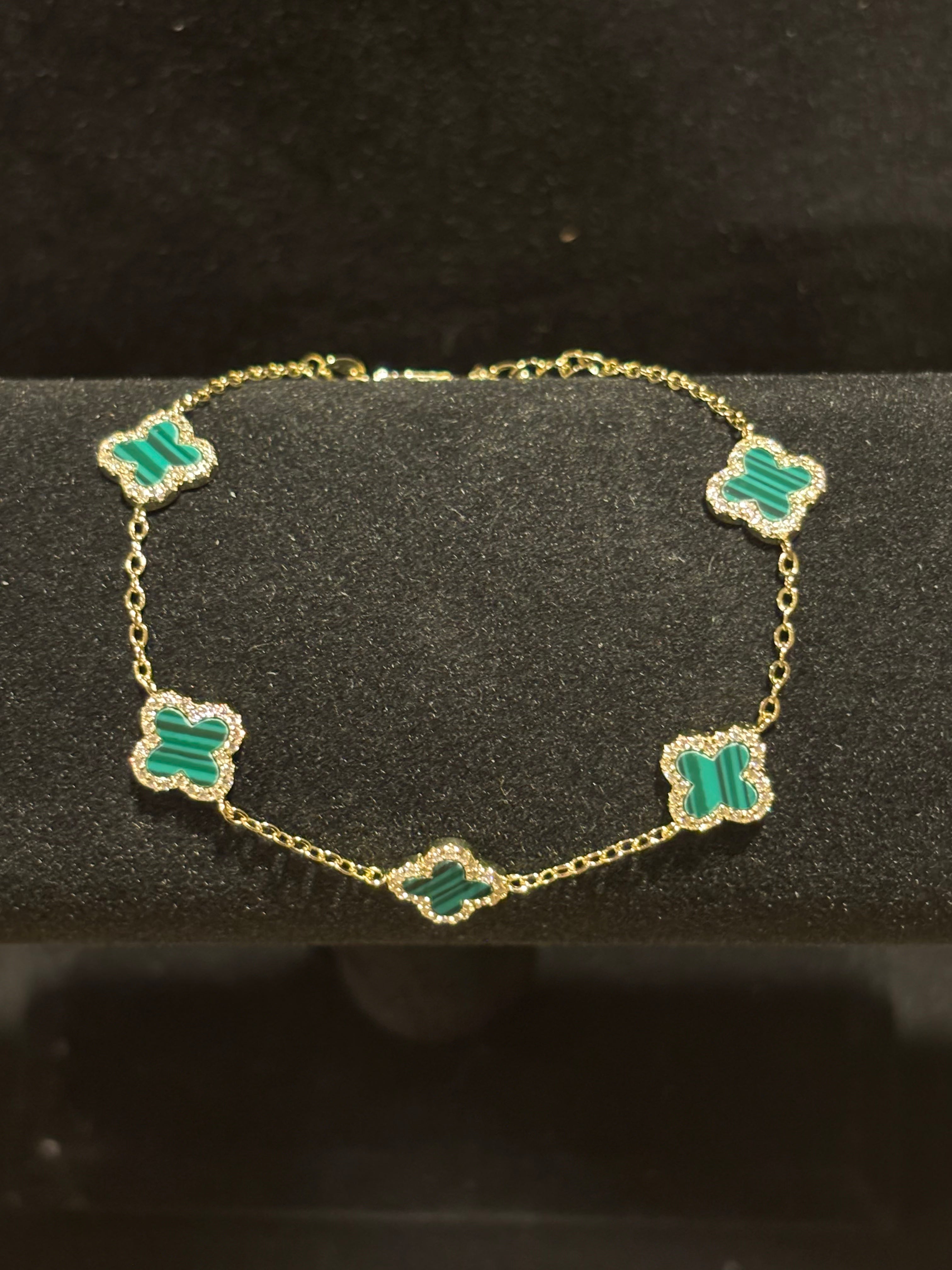 Elegant Five-Motif Green Clover Charm Bracelet