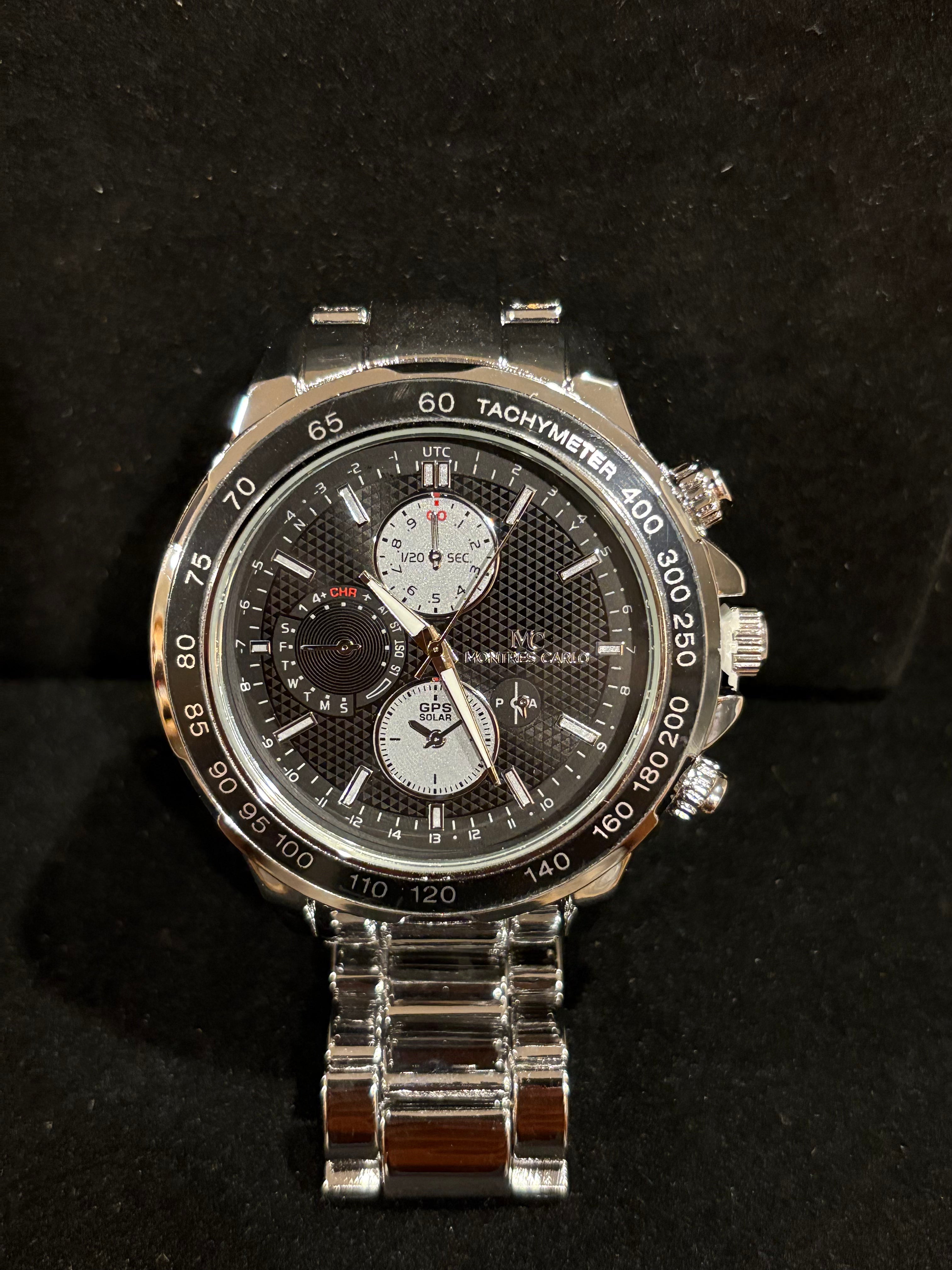 Steel Elegance: Men’s Montres Carlo Silver-Tone Tachymeter Watch (50mm)