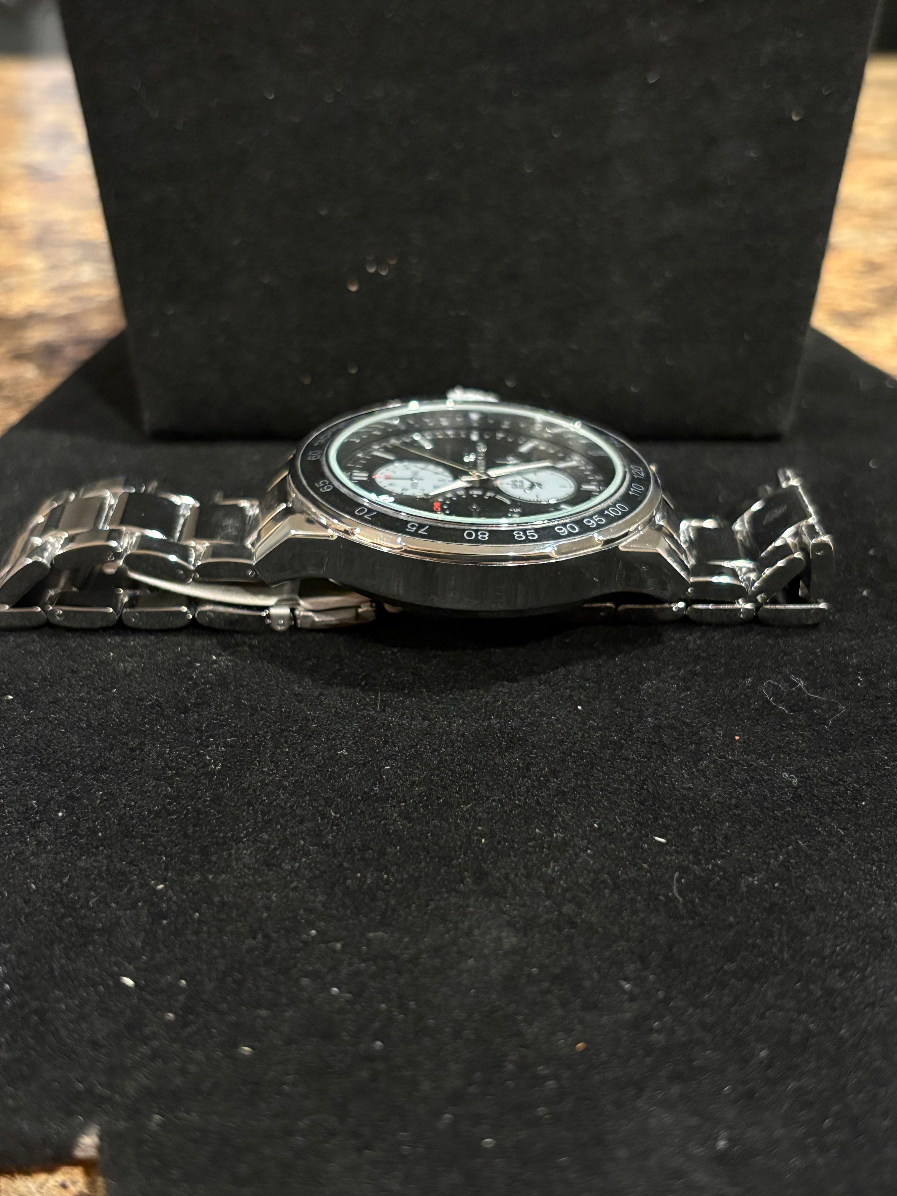 Steel Elegance: Men’s Montres Carlo Silver-Tone Tachymeter Watch (50mm)