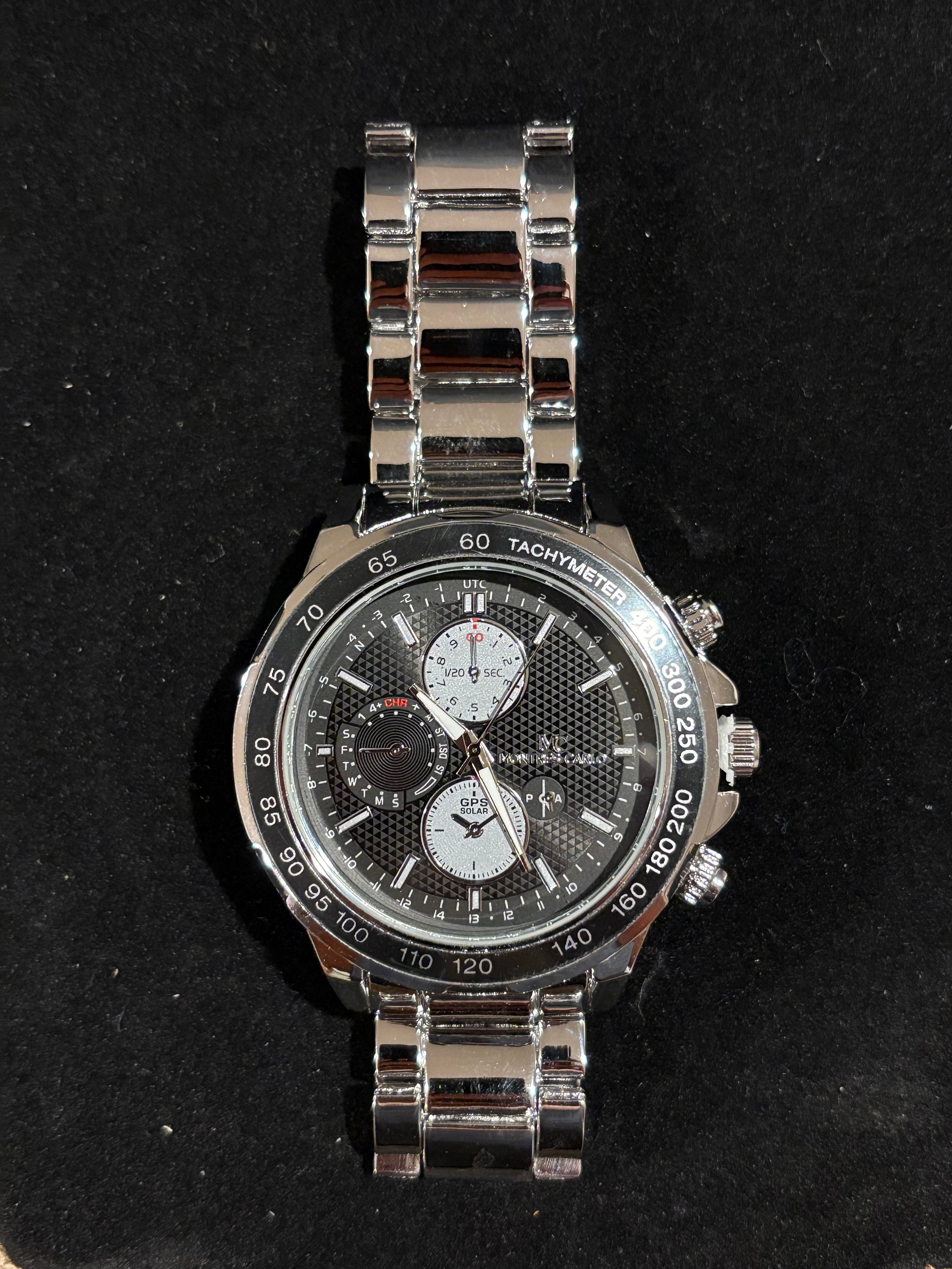 Steel Elegance: Men’s Montres Carlo Silver-Tone Tachymeter Watch (50mm)