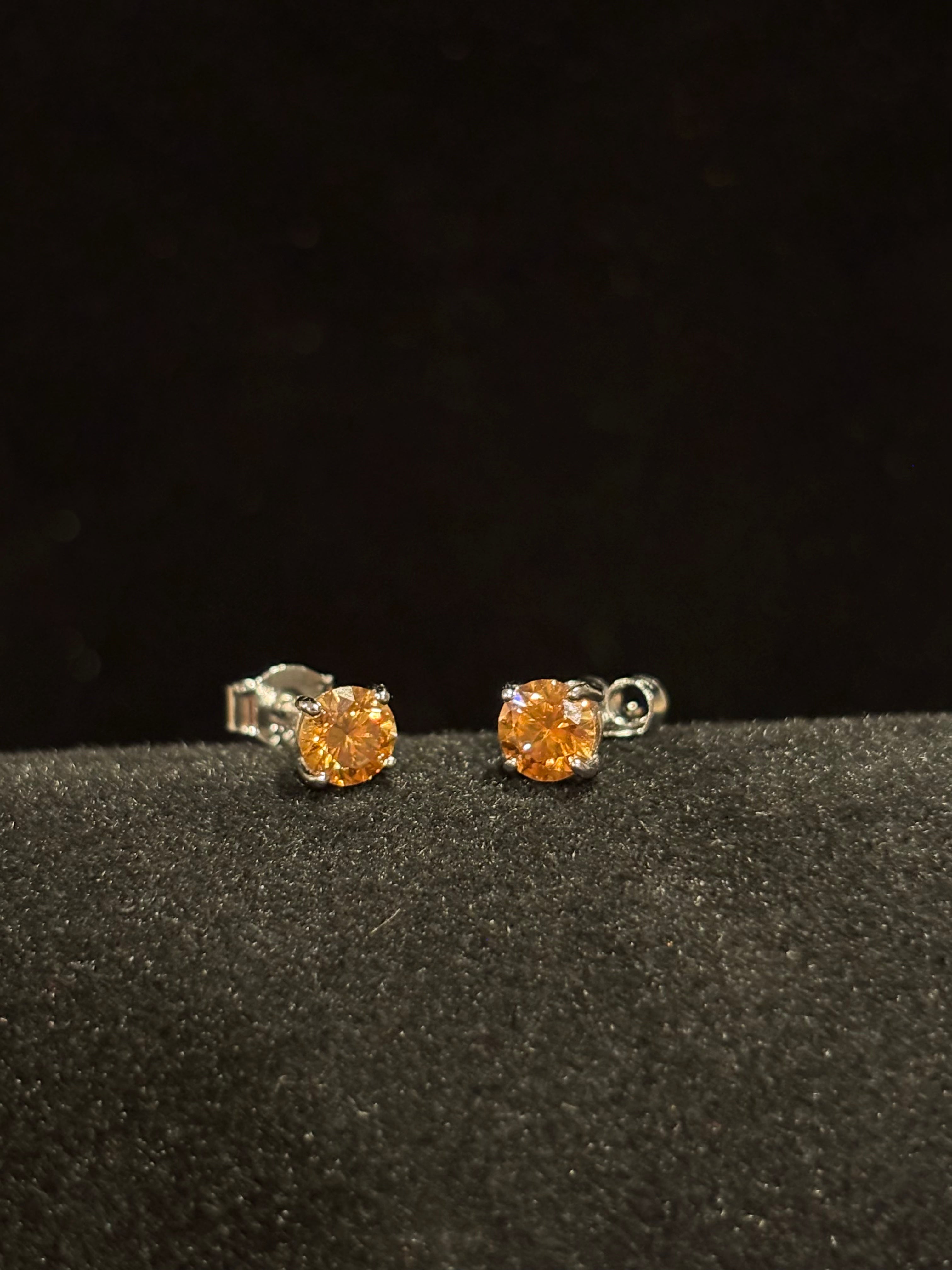 Vibrant Dark Yellow Round Moissanite Stud Earrings in Sterling Silver