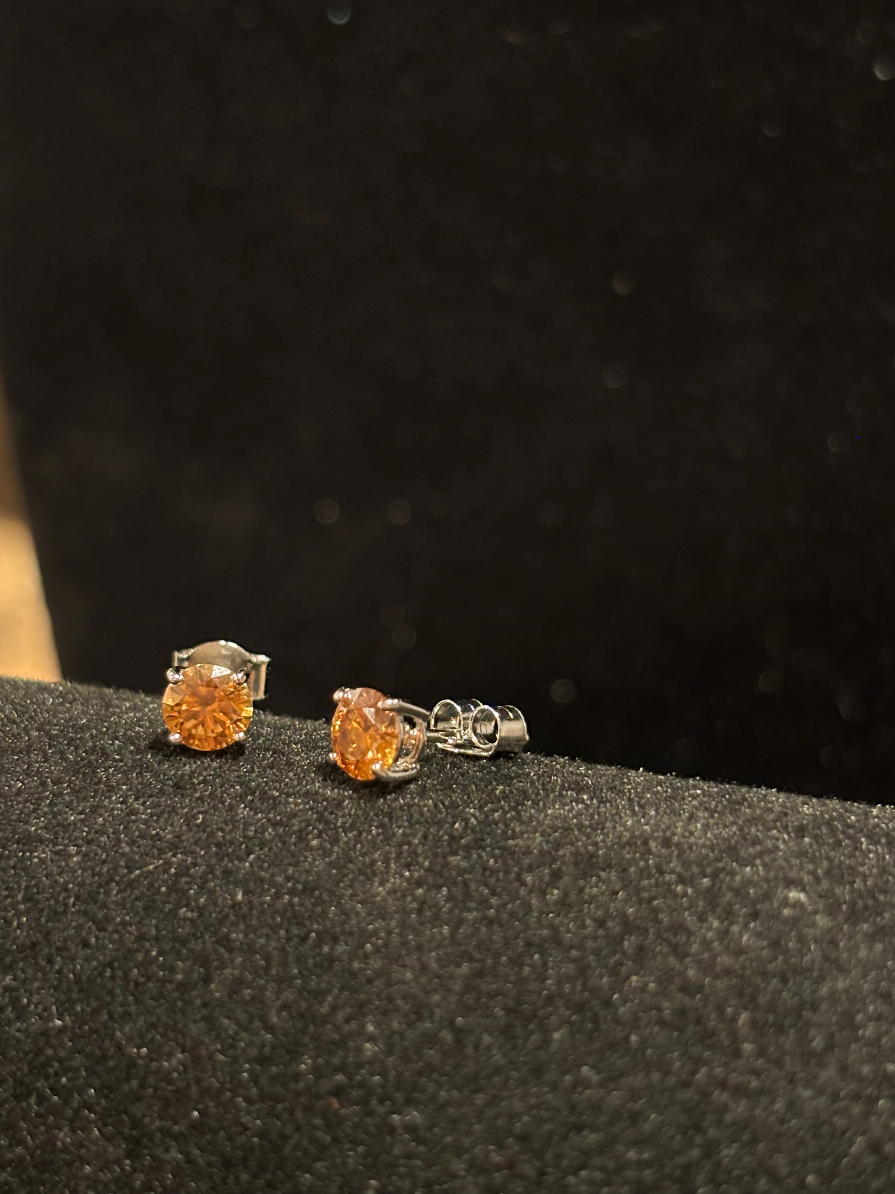 Vibrant Dark Yellow Round Moissanite Stud Earrings in Sterling Silver