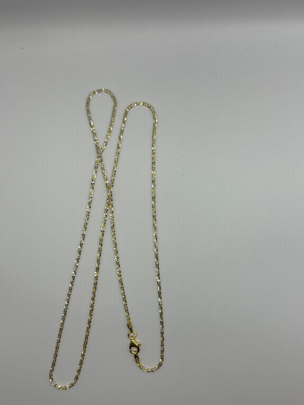 Twisted rock chain features a textured, spiral design crafted to reflect light from every angle