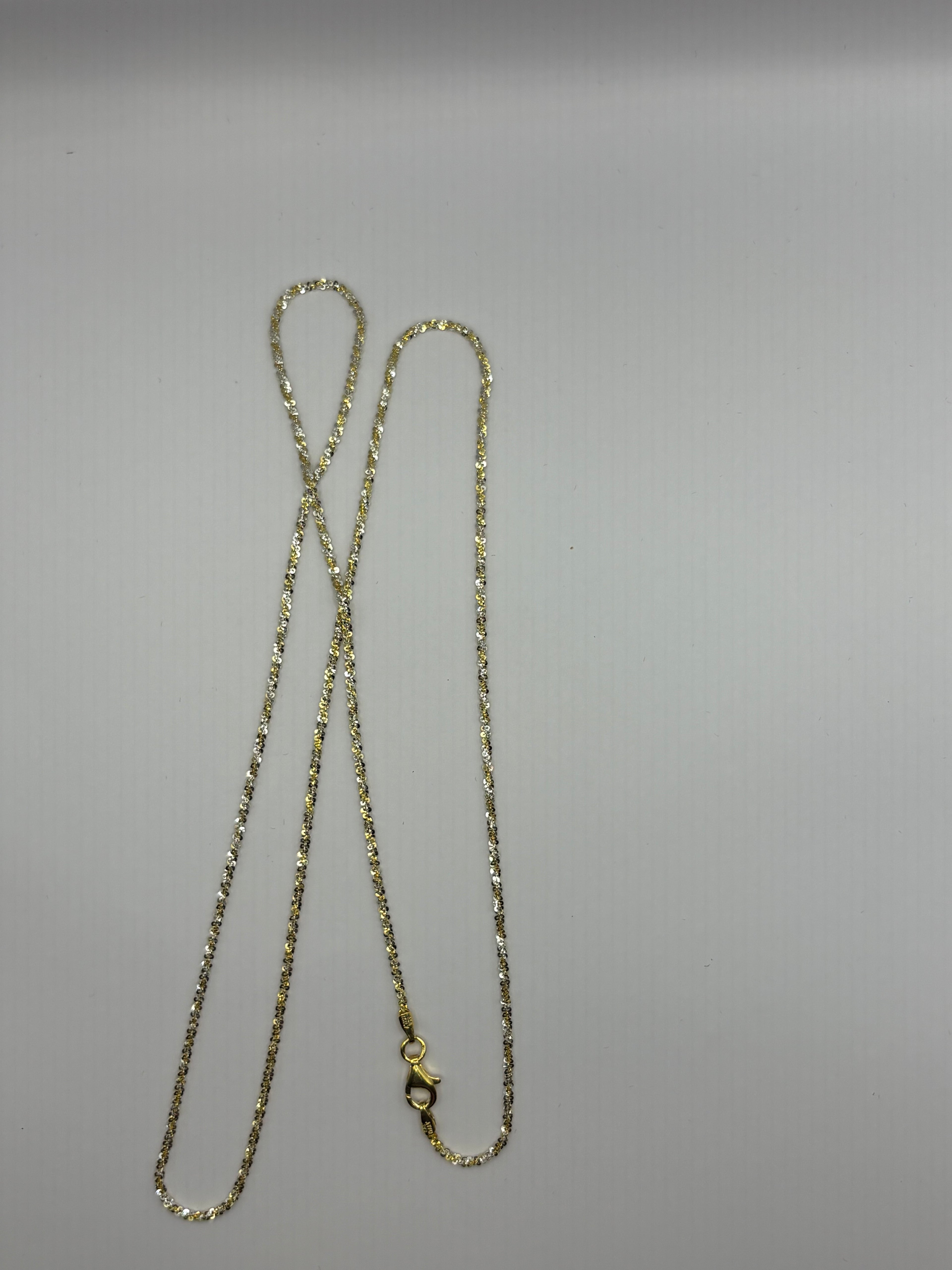 Twisted rock chain features a textured, spiral design crafted to reflect light from every angle