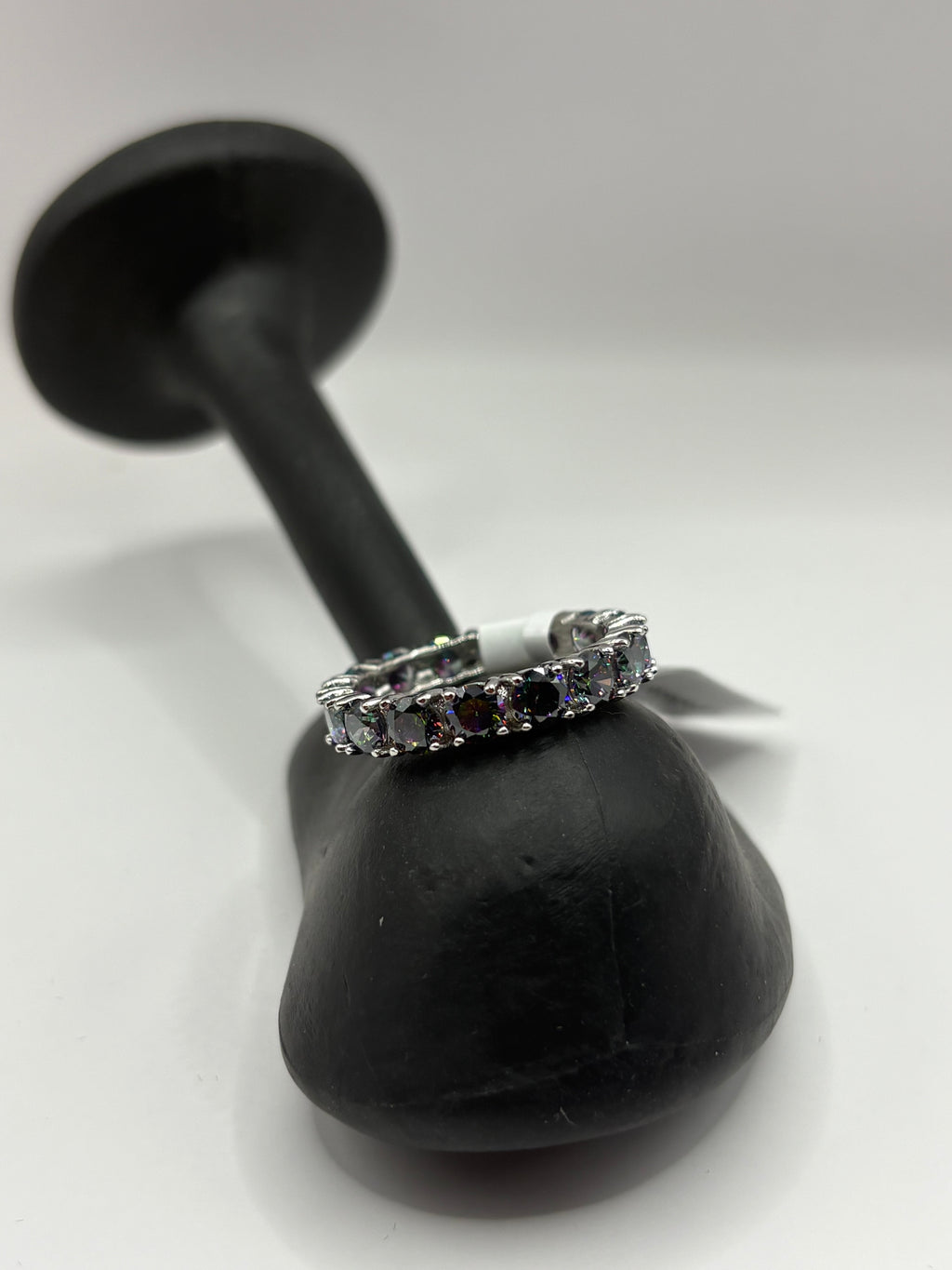 Mystic Topaz Eternity Ring combines continuous brilliant-cut gemstones with a sleek, polished finish
